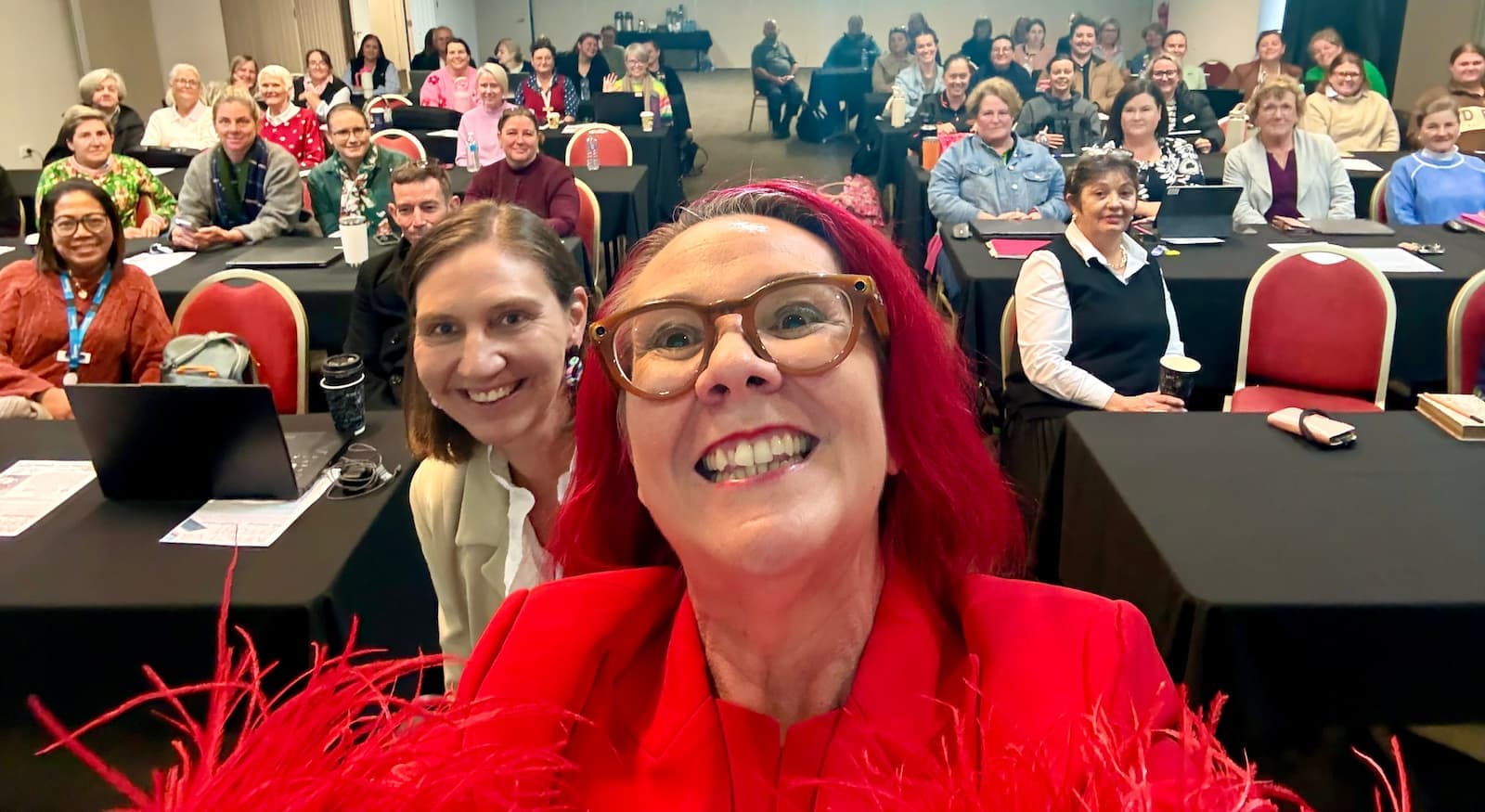 Tracy Sheen's selfie with the full AI Made Simple workshop room behind her in Roma