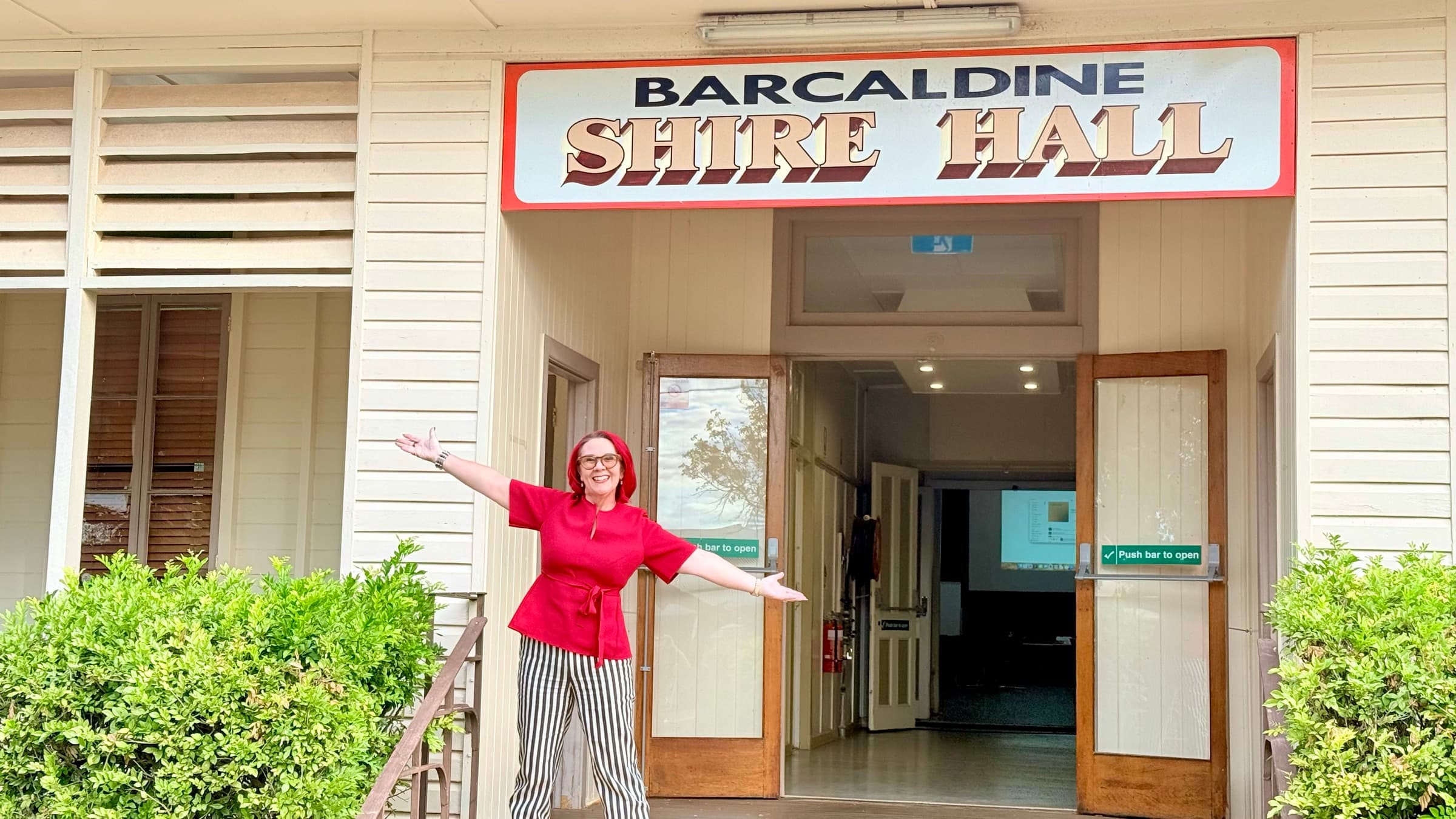 Tracy Sheen outside the Barcaldine Shire Hall before a regional AI workshop.