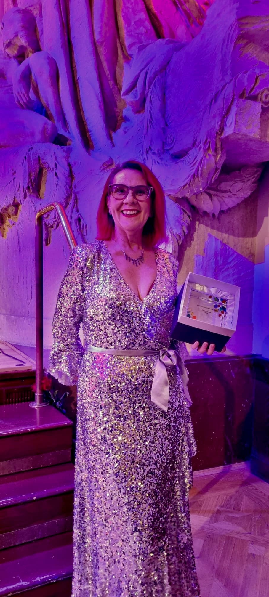 Tracy Sheen holding the FCEM Digital Entrepreneur Award in Prague